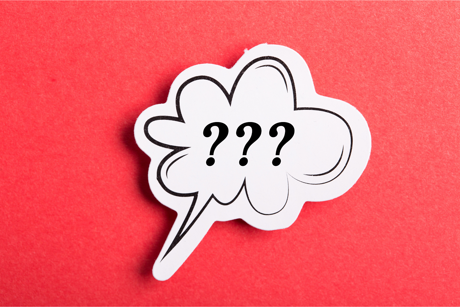 A thought bubble with three question marks inside on a red background, representing questions to ask a charity lottery provider